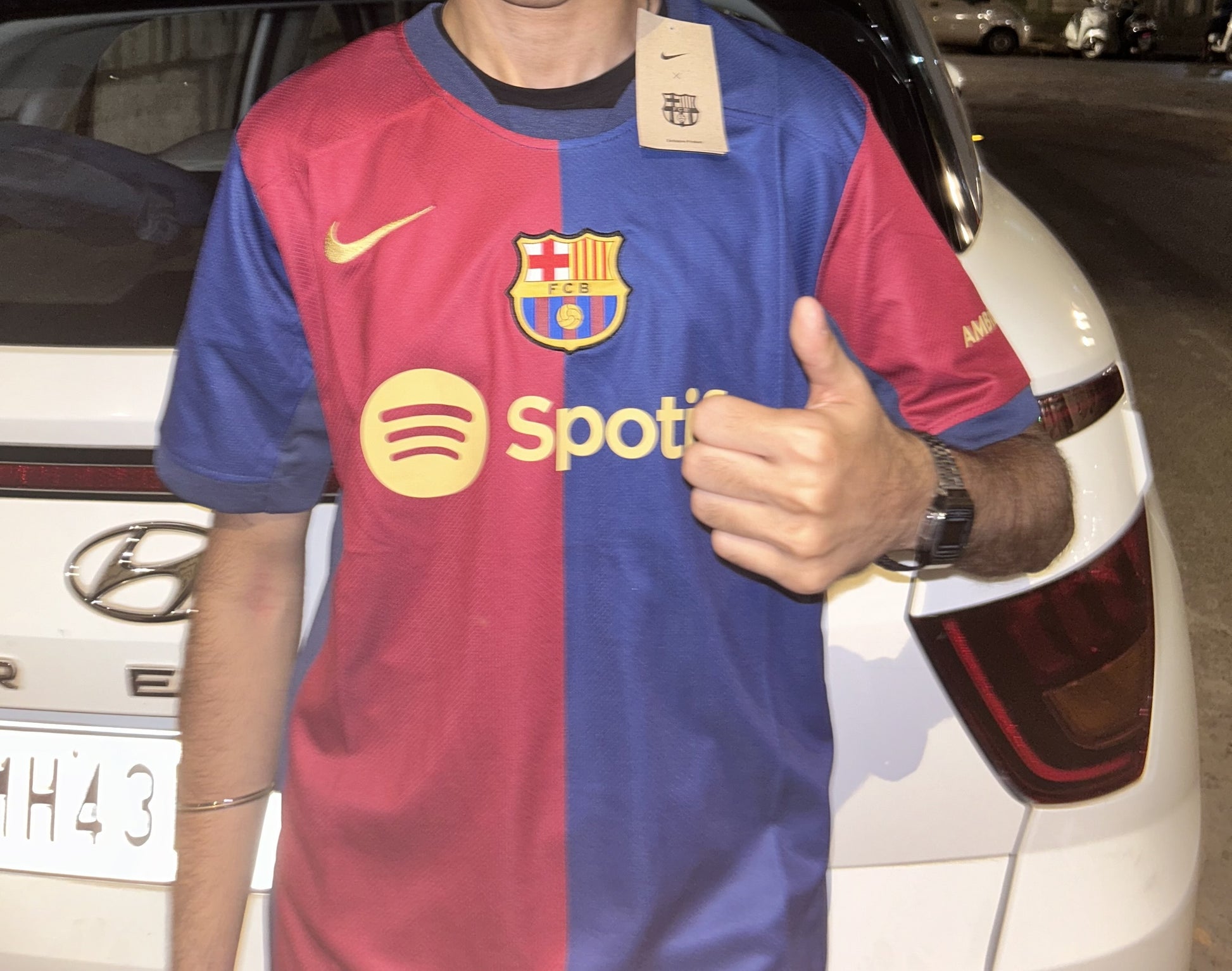 guy wearing barca 24/25 kit